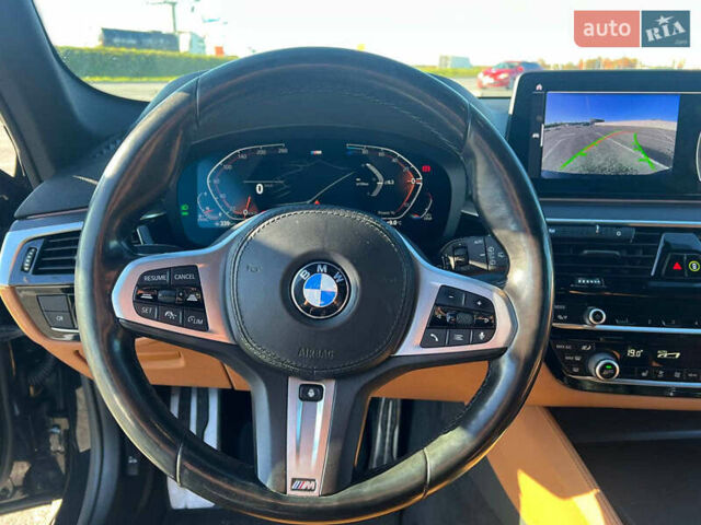 Черный БМВ 5 Серия, объемом двигателя 2 л и пробегом 190 тыс. км за 32790 $, фото 36 на Automoto.ua