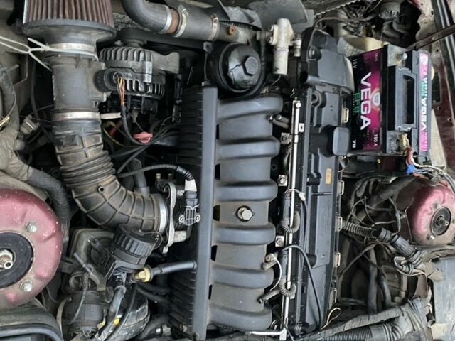 Красный БМВ 5 Серия, объемом двигателя 2.5 л и пробегом 200 тыс. км за 1600 $, фото 1 на Automoto.ua