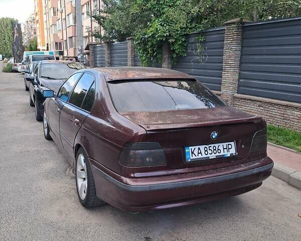 Красный БМВ 5 Серия, объемом двигателя 2.8 л и пробегом 300 тыс. км за 4000 $, фото 1 на Automoto.ua
