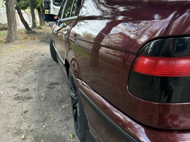 Красный БМВ 5 Серия, объемом двигателя 2.5 л и пробегом 450 тыс. км за 2799 $, фото 2 на Automoto.ua