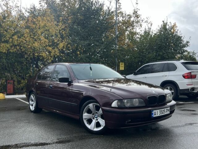 Красный БМВ 5 Серия, объемом двигателя 2 л и пробегом 520 тыс. км за 3500 $, фото 1 на Automoto.ua