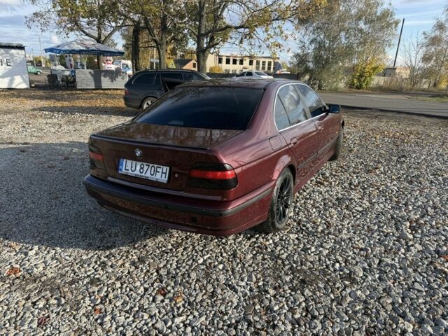 Красный БМВ 5 Серия, объемом двигателя 2.5 л и пробегом 450 тыс. км за 2799 $, фото 5 на Automoto.ua