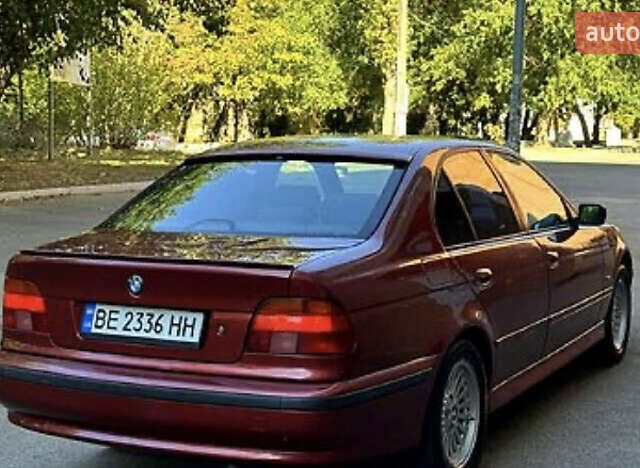 Красный БМВ 5 Серия, объемом двигателя 2 л и пробегом 325 тыс. км за 5000 $, фото 5 на Automoto.ua