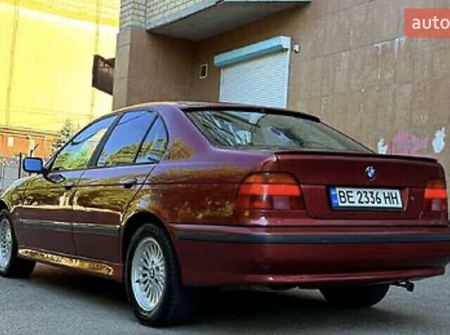 Красный БМВ 5 Серия, объемом двигателя 2 л и пробегом 325 тыс. км за 5000 $, фото 4 на Automoto.ua