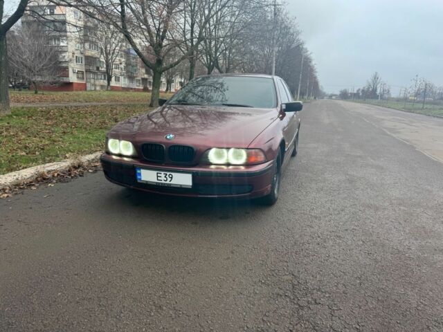 Красный БМВ 5 Серия, объемом двигателя 2.5 л и пробегом 400 тыс. км за 2800 $, фото 2 на Automoto.ua