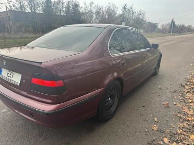 Красный БМВ 5 Серия, объемом двигателя 2.5 л и пробегом 400 тыс. км за 2800 $, фото 3 на Automoto.ua