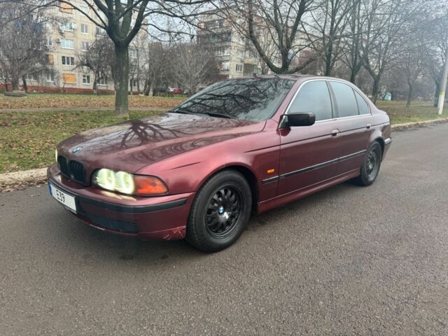 Красный БМВ 5 Серия, объемом двигателя 2.5 л и пробегом 400 тыс. км за 2800 $, фото 1 на Automoto.ua