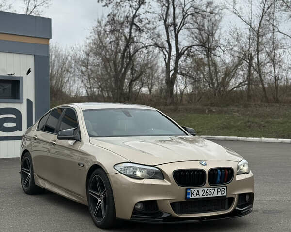 Желтый БМВ 5 Серия, объемом двигателя 2 л и пробегом 245 тыс. км за 14100 $, фото 3 на Automoto.ua