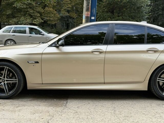 Желтый БМВ 5 Серия, объемом двигателя 2 л и пробегом 251 тыс. км за 14000 $, фото 1 на Automoto.ua