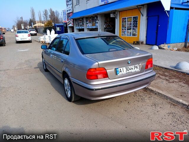 Серый БМВ 5 Серия, объемом двигателя 3.5 л и пробегом 400 тыс. км за 4200 $, фото 3 на Automoto.ua