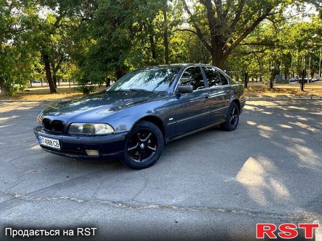 Серый БМВ 5 Серия, объемом двигателя 2.5 л и пробегом 395 тыс. км за 3350 $, фото 1 на Automoto.ua