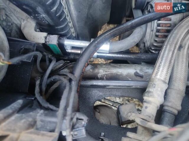 Серый БМВ 5 Серия, объемом двигателя 4.4 л и пробегом 999 тыс. км за 7800 $, фото 2 на Automoto.ua