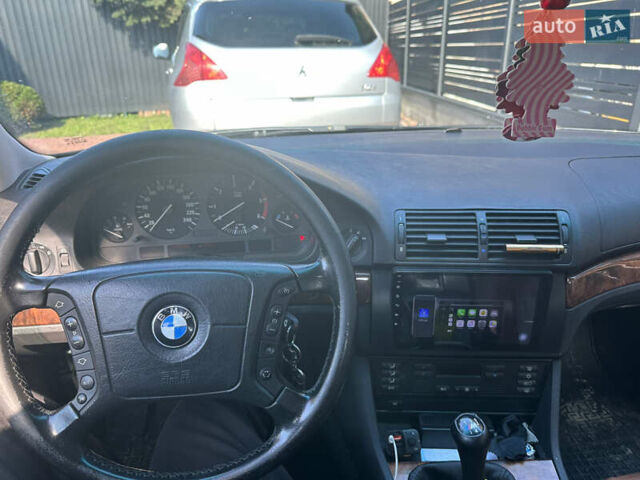 Серый БМВ 5 Серия, объемом двигателя 2.5 л и пробегом 440 тыс. км за 6500 $, фото 6 на Automoto.ua