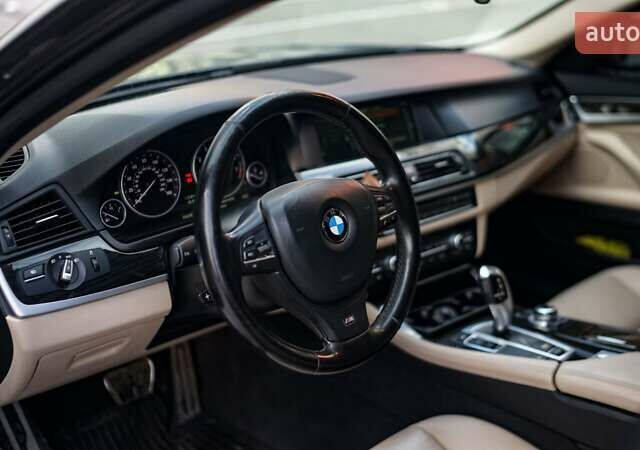 Серый БМВ 5 Серия, объемом двигателя 2 л и пробегом 175 тыс. км за 13350 $, фото 9 на Automoto.ua
