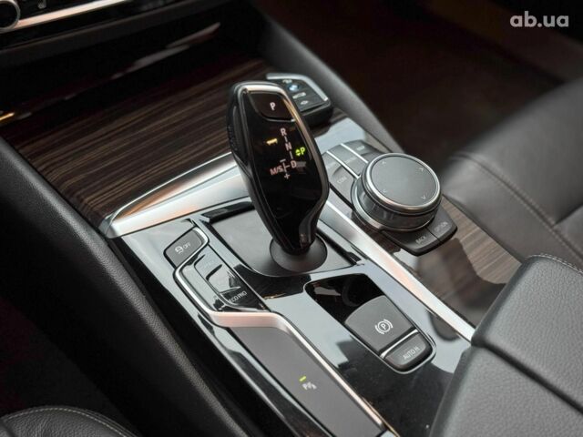 Серый БМВ 5 Серия, объемом двигателя 2 л и пробегом 241 тыс. км за 27990 $, фото 31 на Automoto.ua