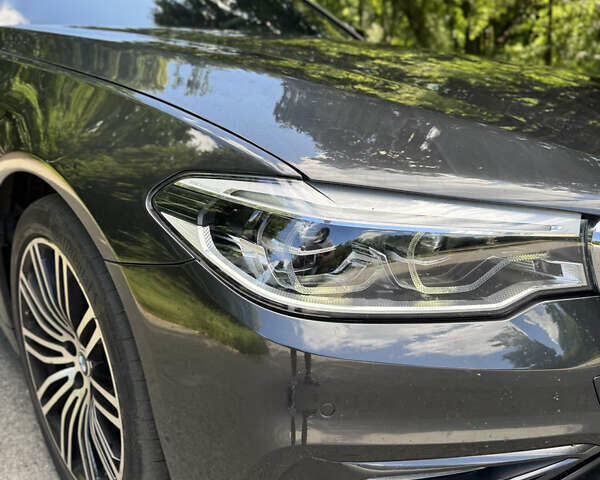 Серый БМВ 5 Серия, объемом двигателя 2 л и пробегом 128 тыс. км за 28999 $, фото 2 на Automoto.ua