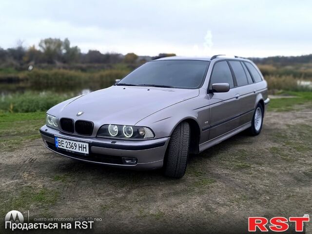 Серый БМВ 5 Серия, объемом двигателя 2.5 л и пробегом 350 тыс. км за 4000 $, фото 1 на Automoto.ua