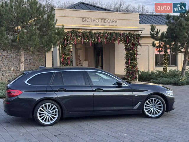 Серый БМВ 5 Серия, объемом двигателя 2 л и пробегом 246 тыс. км за 26500 $, фото 4 на Automoto.ua