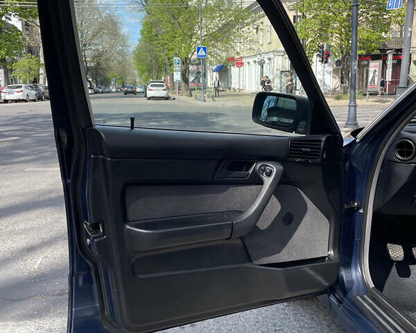 Синій БМВ 5 Серія, об'ємом двигуна 2.3 л та пробігом 295 тис. км за 5000 $, фото 21 на Automoto.ua