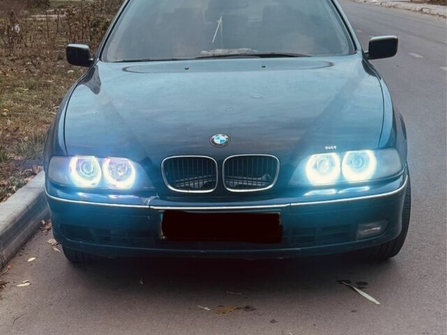 Синий БМВ 5 Серия, объемом двигателя 2.5 л и пробегом 400 тыс. км за 2800 $, фото 1 на Automoto.ua