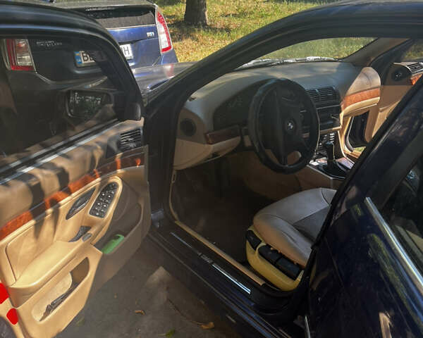 Синий БМВ 5 Серия, объемом двигателя 2.5 л и пробегом 400 тыс. км за 4000 $, фото 4 на Automoto.ua