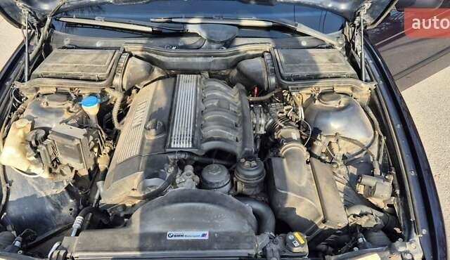 Синий БМВ 5 Серия, объемом двигателя 2.5 л и пробегом 400 тыс. км за 9000 $, фото 23 на Automoto.ua