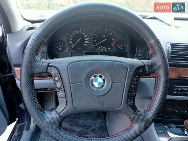 Синий БМВ 5 Серия, объемом двигателя 2.8 л и пробегом 400 тыс. км за 5000 $, фото 11 на Automoto.ua
