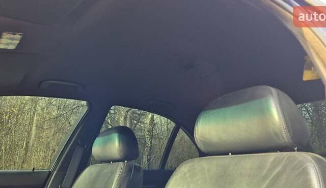 Синий БМВ 5 Серия, объемом двигателя 2.5 л и пробегом 400 тыс. км за 9000 $, фото 13 на Automoto.ua