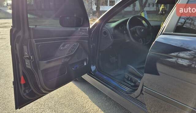 Синий БМВ 5 Серия, объемом двигателя 2.5 л и пробегом 400 тыс. км за 9000 $, фото 11 на Automoto.ua