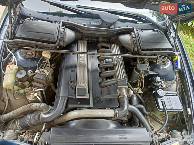 Синий БМВ 5 Серия, объемом двигателя 2.5 л и пробегом 370 тыс. км за 4850 $, фото 19 на Automoto.ua