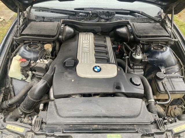 Синий БМВ 5 Серия, объемом двигателя 2.5 л и пробегом 376 тыс. км за 3700 $, фото 3 на Automoto.ua