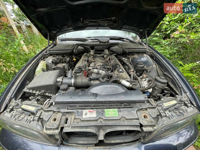 Синий БМВ 5 Серия, объемом двигателя 4.4 л и пробегом 357 тыс. км за 5250 $, фото 10 на Automoto.ua