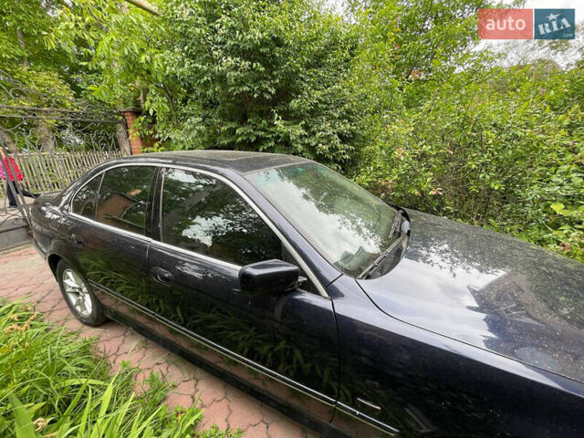 Синий БМВ 5 Серия, объемом двигателя 4.4 л и пробегом 357 тыс. км за 5250 $, фото 11 на Automoto.ua