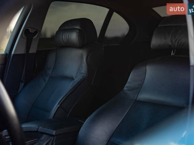 Синий БМВ 5 Серия, объемом двигателя 3.5 л и пробегом 250 тыс. км за 13000 $, фото 52 на Automoto.ua