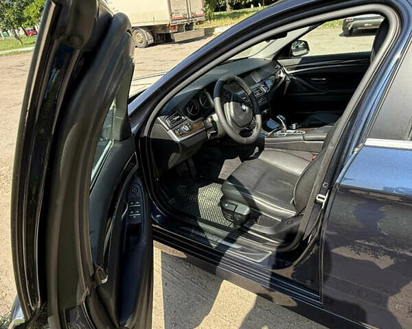 Синій БМВ 5 Серія, об'ємом двигуна 2 л та пробігом 185 тис. км за 15200 $, фото 13 на Automoto.ua