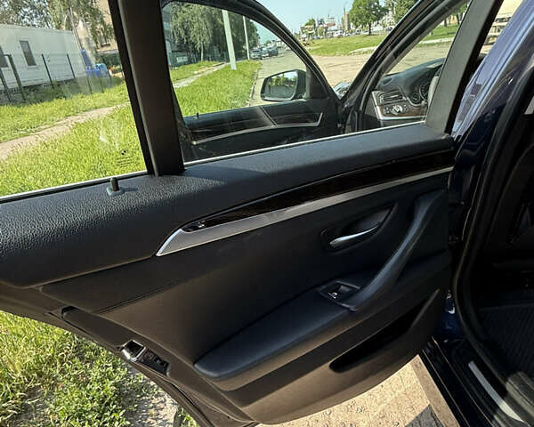 Синій БМВ 5 Серія, об'ємом двигуна 2 л та пробігом 185 тис. км за 15200 $, фото 8 на Automoto.ua