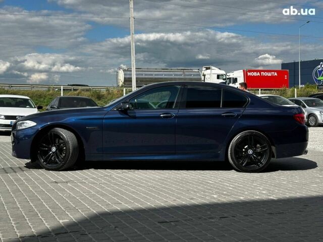 Синій БМВ 5 Серія, об'ємом двигуна 2 л та пробігом 242 тис. км за 18790 $, фото 4 на Automoto.ua