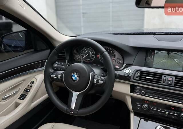 Синій БМВ 5 Серія, об'ємом двигуна 2 л та пробігом 144 тис. км за 15200 $, фото 11 на Automoto.ua