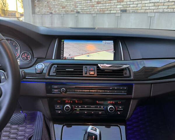 Синій БМВ 5 Серія, об'ємом двигуна 2 л та пробігом 115 тис. км за 18000 $, фото 26 на Automoto.ua