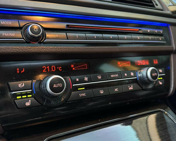 Синій БМВ 5 Серія, об'ємом двигуна 2 л та пробігом 115 тис. км за 18000 $, фото 28 на Automoto.ua