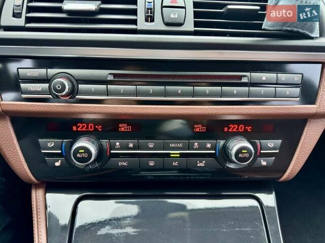 Синій БМВ 5 Серія, об'ємом двигуна 2 л та пробігом 115 тис. км за 21900 $, фото 77 на Automoto.ua