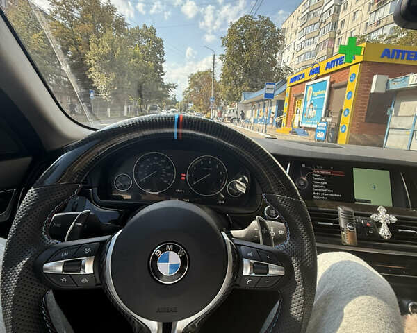 Синий БМВ 5 Серия, объемом двигателя 2.98 л и пробегом 112 тыс. км за 23000 $, фото 1 на Automoto.ua