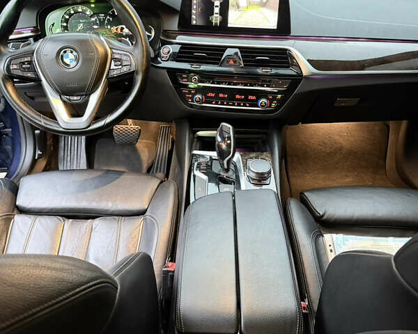 Синий БМВ 5 Серия, объемом двигателя 2 л и пробегом 210 тыс. км за 19950 $, фото 6 на Automoto.ua