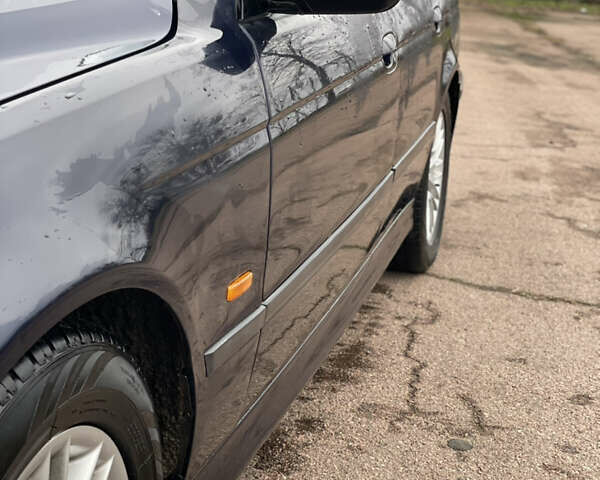 Синий БМВ 5 Серия, объемом двигателя 2.5 л и пробегом 367 тыс. км за 3850 $, фото 10 на Automoto.ua