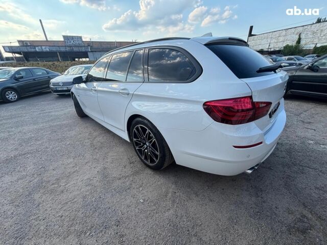 Синий БМВ 5 Серия, объемом двигателя 2 л и пробегом 238 тыс. км за 16990 $, фото 2 на Automoto.ua