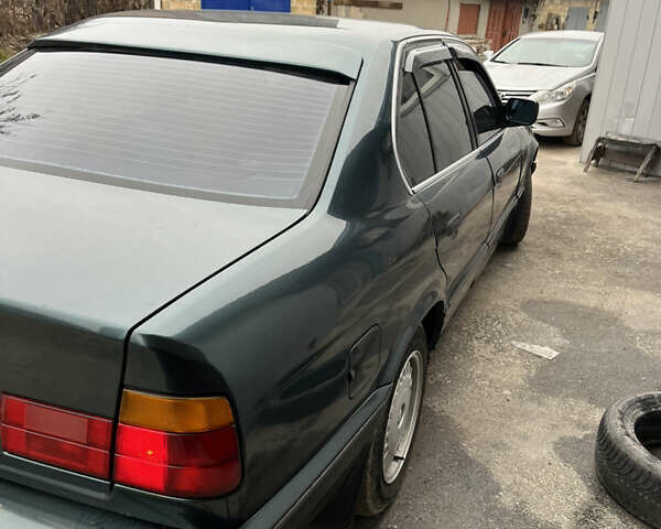 Зеленый БМВ 5 Серия, объемом двигателя 2.5 л и пробегом 300 тыс. км за 2500 $, фото 2 на Automoto.ua