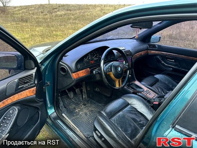 Зеленый БМВ 5 Серия, объемом двигателя 2.8 л и пробегом 326 тыс. км за 5500 $, фото 7 на Automoto.ua