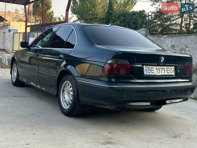 Зеленый БМВ 5 Серия, объемом двигателя 2.5 л и пробегом 400 тыс. км за 3300 $, фото 7 на Automoto.ua