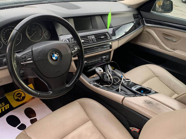 Серый БМВ 520, объемом двигателя 2 л и пробегом 354 тыс. км за 12990 $, фото 7 на Automoto.ua