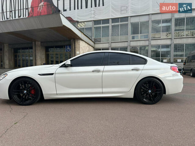 Белый БМВ 6 Серия, объемом двигателя 2.98 л и пробегом 157 тыс. км за 25000 $, фото 6 на Automoto.ua